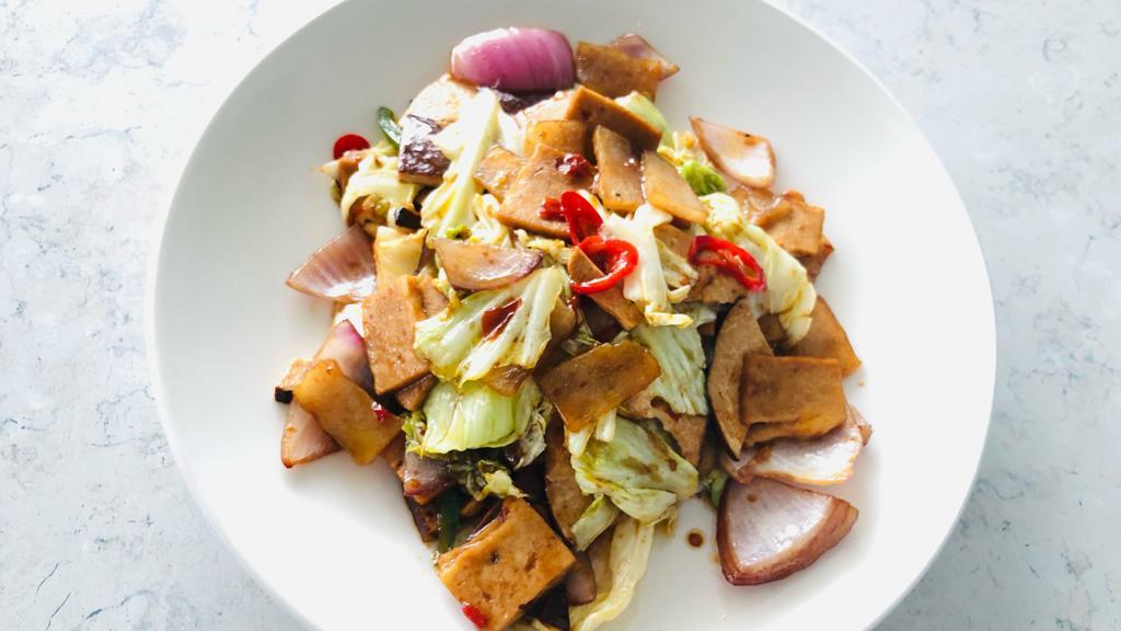 Twice-Cooked Pork · Vegan Pork Belly, Cabbage, Onion, Scallion& Pepper stir fried with Spicy Chili Bean Paste.