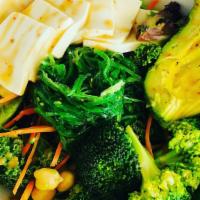 Power Bowl · Mix green, kale, chickpeas, broccoli, carrot, tofu, seaweed, avocado with citrus vinaigrette.