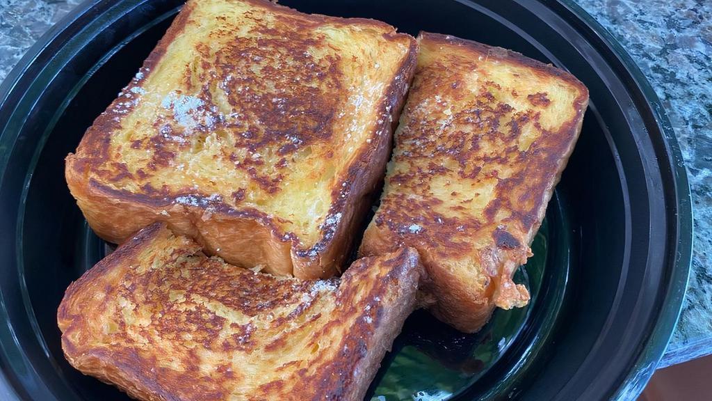 French Toast · Made with our special thick and served with whipped butler.