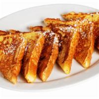 French Toast · Six filling slices of French toast sprinkled with powdered sugar and served with one syrup c...