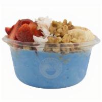 Avalanche Bowl · coconut blend with blue spirulina topped with blueberry flax granola, banana,  strawberry, w...