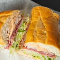 The #27 · Corned beef, turkey, swiss, and american cheese, russian dressing, lettuce, tomato, and onio...