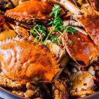 Special Wok-Fried Crab Pot / 蟹肉煲 · Hot. Blue crabs, shrimp, chicken feet, potato, and aged tofu.