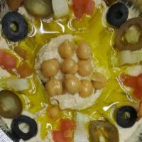 Hummus · Vegetarian. Hummus is a levantine dip or spread made from cooked, mashed chickpeas, blended ...