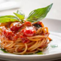 Spaghettoni Al Pomodoro · Artisanal spaghetti from Pastificio Dei scampi, with 