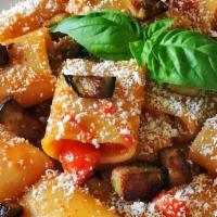 Paccheri Alle Melanzane · Eggplant, vegan mozzarella and cherry tomatoes.