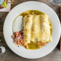Enchiladas Suizas · Three soft corn tortillas filled with grilled chicken or steak or ground beef, tomatillo sau...