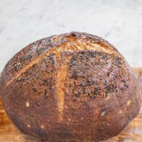 Organic Sourdough Bread Loaf · Baked fresh daily using organic grains from upstate New York. Made with 100% SanFranciscan &...