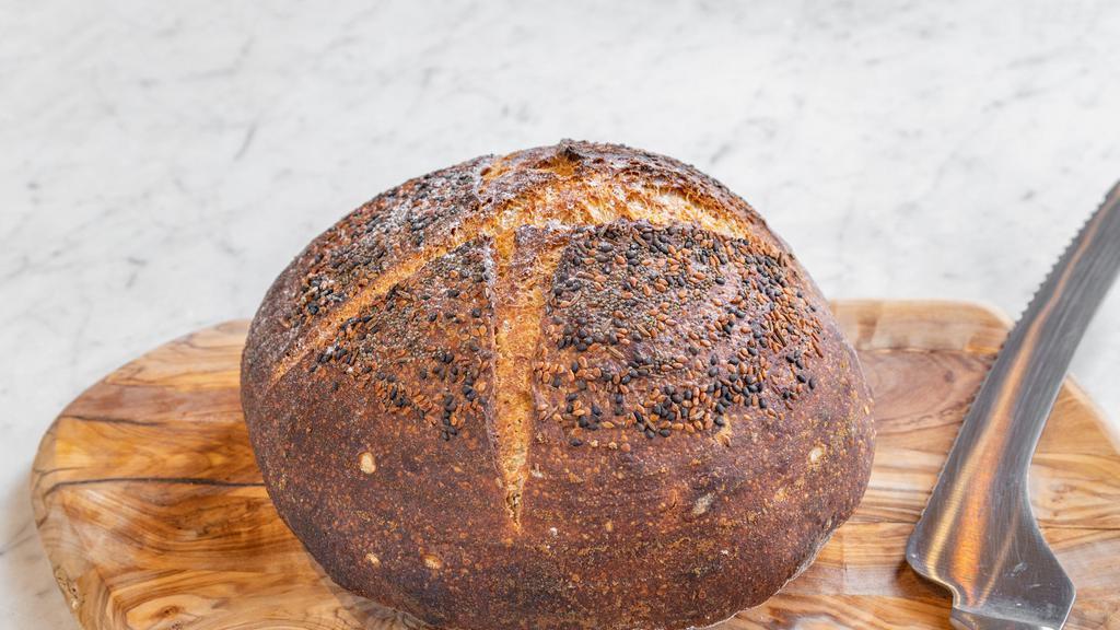 Organic Sourdough Bread Loaf · Baked fresh daily using organic grains from upstate New York. Made with 100% SanFranciscan & German sourdough culture, organic rye, organic whole wheat, water and kosher salt. Vegan.