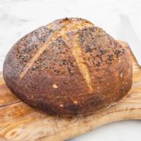 Organic Sourdough Bread Loaf · Baked fresh daily using organic grains from upstate New York. Made with 100% SanFranciscan &...