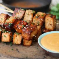Satay Tofu · Crispy tofu stuffed with cucumber, jicama, bean and sprouts served with spicy peanut sauce.