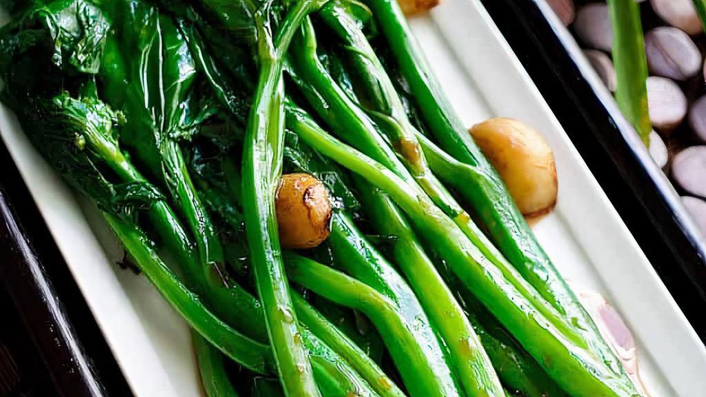 Chinese Broccoli · Chinese broccoli stir fried with fresh garlic, oyster sauce, sesame oil, and rice wine.