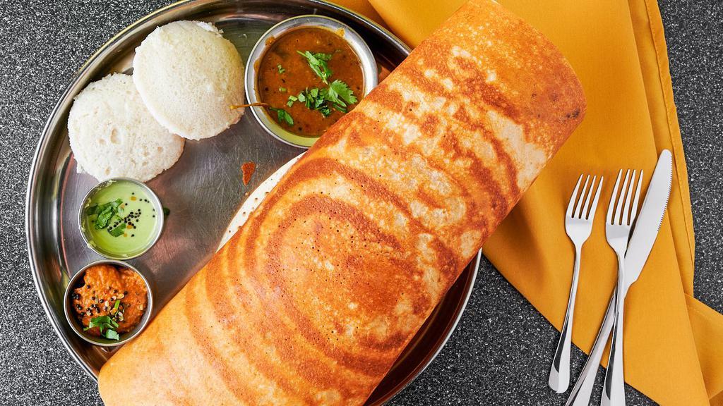 Set Dosa · Rice and lentil crepe with cheese spread.