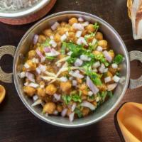 Channa Masala · Chickpeas cooked with onions, tomatoes, and citrus.