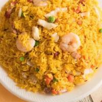 Shrimp Fried Rice · Includes onions, peas, carrots, and beansprouts.