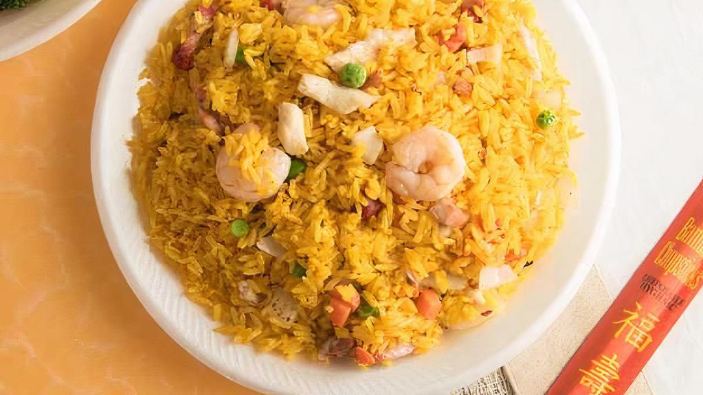 Shrimp Fried Rice · Includes onions, peas, carrots, and beansprouts.