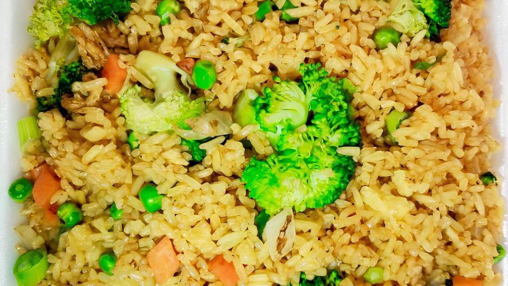 Vegetable Fried Rice · Includes onions, peas, carrots, bok choy, and beansprouts.