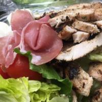 Tuscan Chicken Salad (Large) · Grilled chicken breast, grape tomatoes, prosciutto, fresh mozzarella  and romaine lettuce dr...