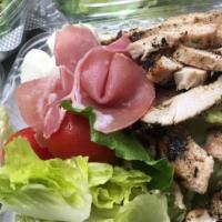 Tuscan Chicken Salad (Small) · Grilled chicken breast, grape tomatoes, prosciutto, and romaine lettuce drizzled with balsam...