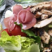 Tuscan Chicken Salad (Half ) · Grilled chicken breast, grape tomatoes, prosciutto, fresh mozzarella  and romaine lettuce dr...