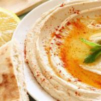 Hummus · Dip came from a blend of fresh chickpeas, tahini sauce, lemon juice, and fresh garlic, toppe...