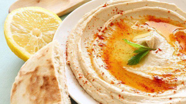 Hummus · Dip came from a blend of fresh chickpeas, tahini sauce, lemon juice, and fresh garlic, topped with olive oil. Served with pita bread.