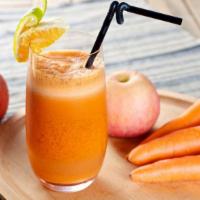 Green Apple Carrot Juice · Fresh squeezed sweet carrots and green apples.
