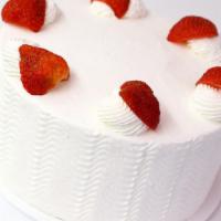 Strawberry Shortcake · Yellow cake with fresh strawberry filling and whipped cream frosting.