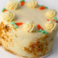 Carrot · Sweet moistened sponge made with
carrots and toasted nuts covered in cream
cheese filling & ...