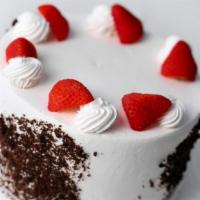 Molly Brown · Chocolate cake with fresh strawberry and bananas and whipped cream frosting.