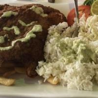 Milanesa De Carne · (Steak cutlet with rice and fries)