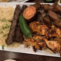 Mixed Kebab Platter · One shish kebab, one kofta, one taouk. Served with choice of rice or french fries.
