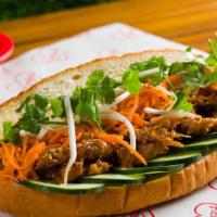 Vegan Ginger Chick'N Banh Mi · Sauteed Vegan Ginger Chick'n served with jalapeno, cucumber, pickled carrots, bean sprouts, ...