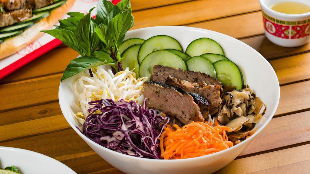 Smoked Brisket Vermicelli Bowl · Vermicelli noodles, pickled carrots, cucumbers, Thai basil, bean sprouts, red cabbage, and shiitake mushrooms. Served with house fish sauce on the side.