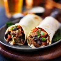 Meat Burrito · Flour tortilla stuffed with rice, beans, onions, tomatoes, cilantro, and choice of meat and ...