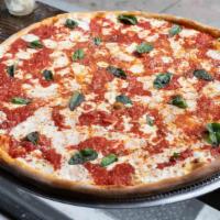 Margherita Slice Pizza · Tomato sauce, Fresh mozzarella, mozzarella, garlic, oregano.