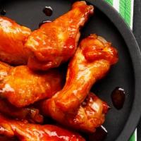 Bbq Chicken Wings  · 7 Delicious chicken wings with  blue cheese or ranch dressing on the side