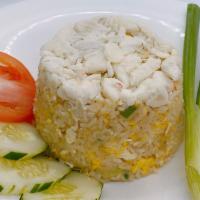 Crab Fried Rice · Fried rice with crab meat, egg, onion, scallions and tomatoes.