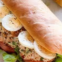 Tuna Nicoise (Baguette) · Garlic mayo on a sourdough baguette, spring mix, flaked tuna, sliced eggs, sliced red pepper...