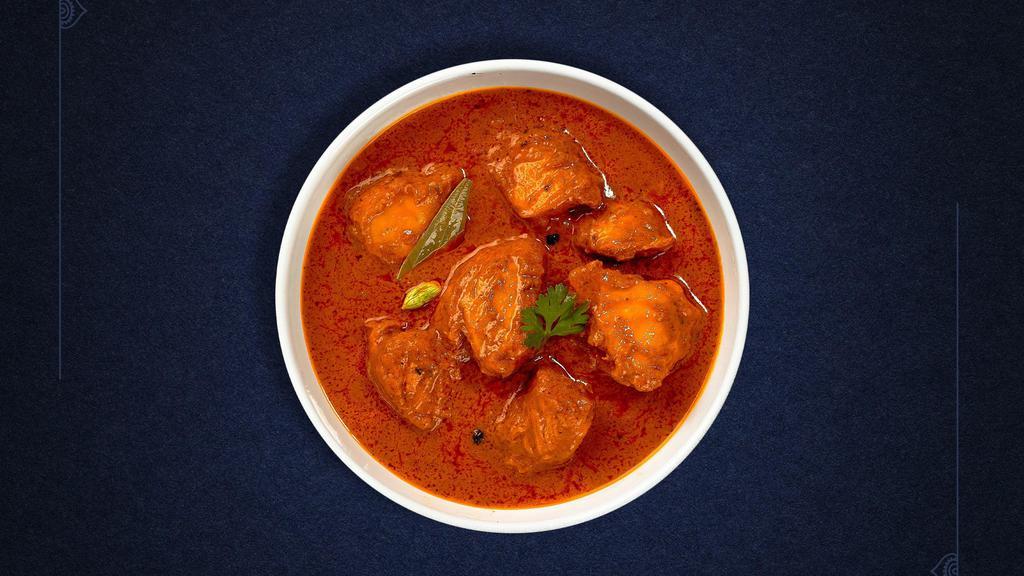 Chicken Vindaloo Valiant · Chunks of chicken cooked with potatoes in a tangy sauce.