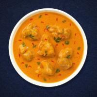 Mughlai Pista Korma · Chunks of chicken braised in a mild rich creamy cashew and pista based sauce.