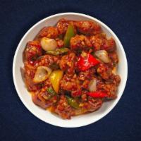 Cluck Chili Thrill · Marinated boneless chicken deep fried in Indian Chinese chilies sauce, tossed with gingery s...