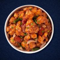 Manchurian Cluckery · Marinated boneless chicken deep fried in Indian Chinese chilies sauce, tossed with gingery s...