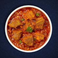 Lamb Gucci Gang Korma · Decadent lamb korma with aromatic spices, enhanced with cardamom, saffron, and creamy cashew...
