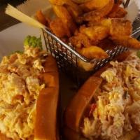 Lobster Rolls · Chunks of fresh lobster meat lightly dressed with mayo, lemon & fresh herbs, served on 2 toa...