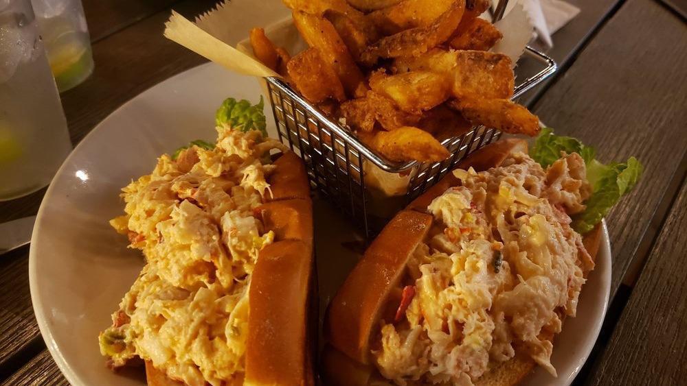 Lobster Rolls · Chunks of fresh lobster meat lightly dressed with mayo, lemon & fresh herbs, served on 2 toasted brioche buns.