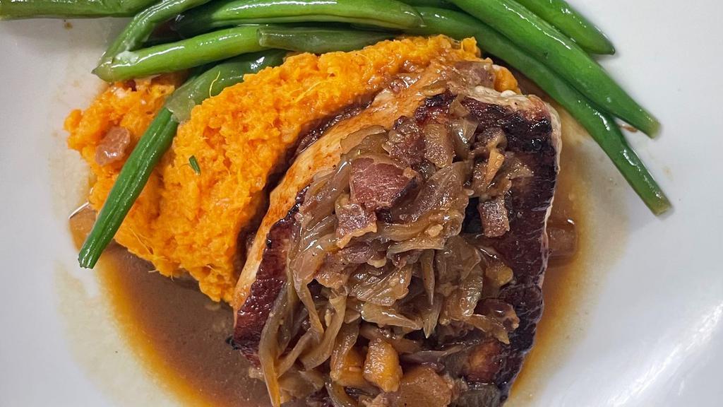 Pork Loin · Topped with a roasted apple, bacon & onion jam, served with sweet potato mash & seasonal vegetables.