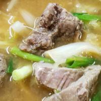 우거지갈비탕 / Short Rib And Cabbage Soup · Ugeoji galbitang / Tender beef short ribs and cabbage soup. Served with kimchi, ban chan (Ve...