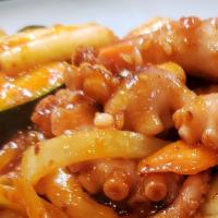 낙지볶음 / Stir-Fried Octopus · Nakji Bok eum / Stir-fried octopus and vegetables with spicy sauce. Served with kimchi, ban ...