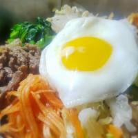 비빔밥 / Bibimbap · Steamed white rice topped with assorted marinated vegetables with fried egg, bit of beef and...